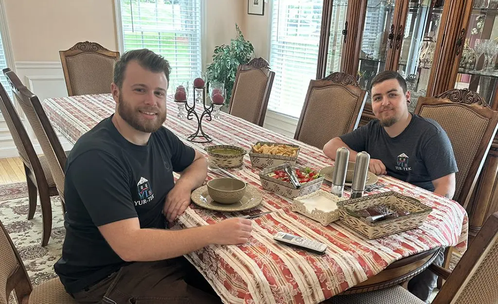 Employees eating lunch made by customer